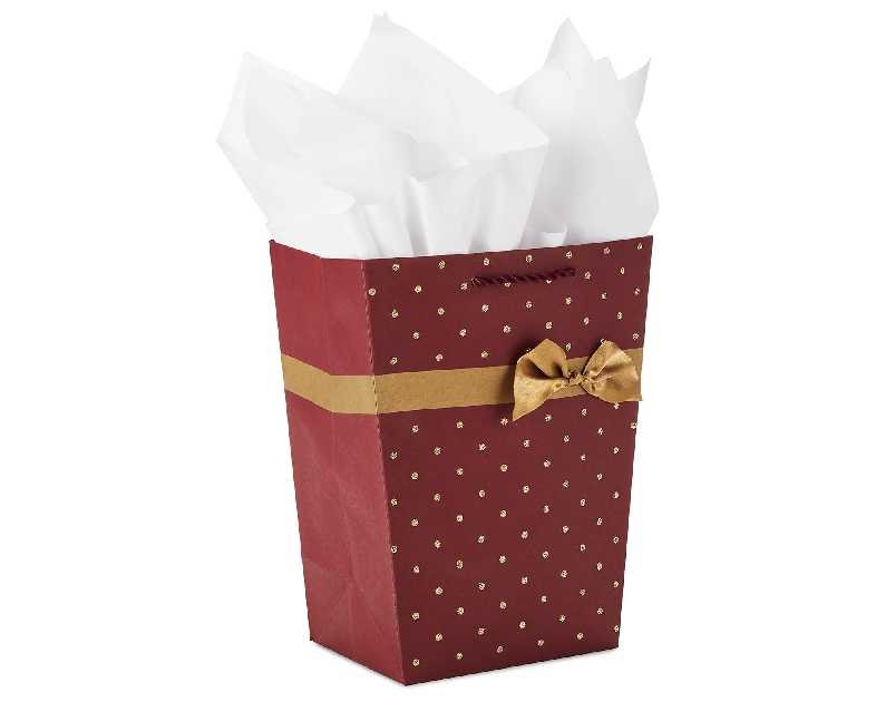 Hallmark 9" Christmas Gift Bag with Tissue Paper (Medium Dark Red Trapezoid Bag with Gold Glitter and Ribbon) for Holiday Parties, Winter Weddings